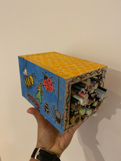 Image of a decorated and filled EnviroMentoring DIY Bug Hotel Kit.
